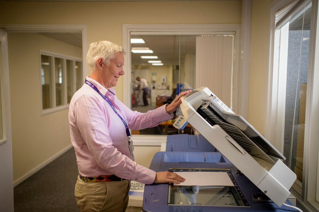 person scanning documents